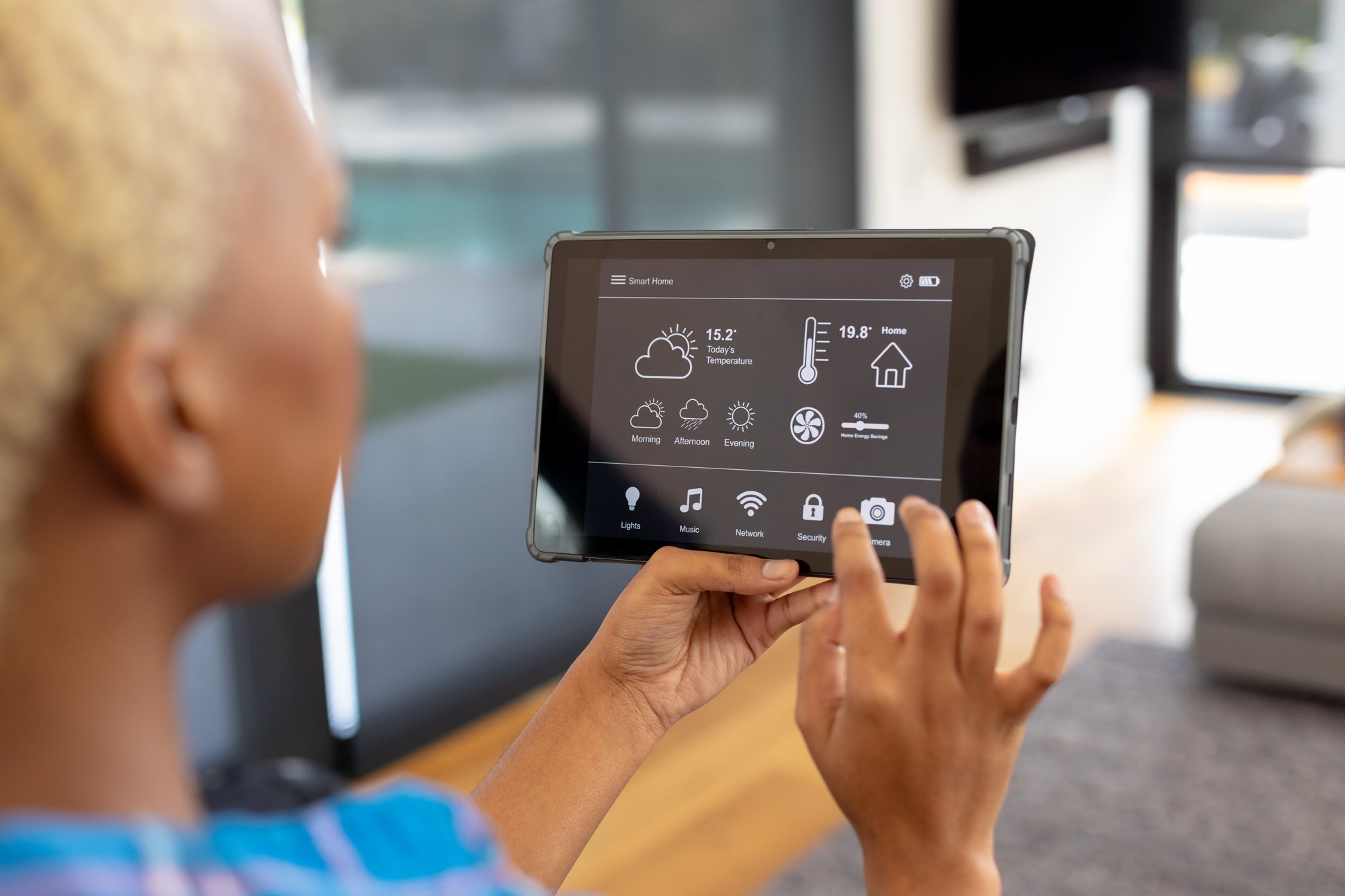 african-american-woman-using-tablet-with-smart-home
