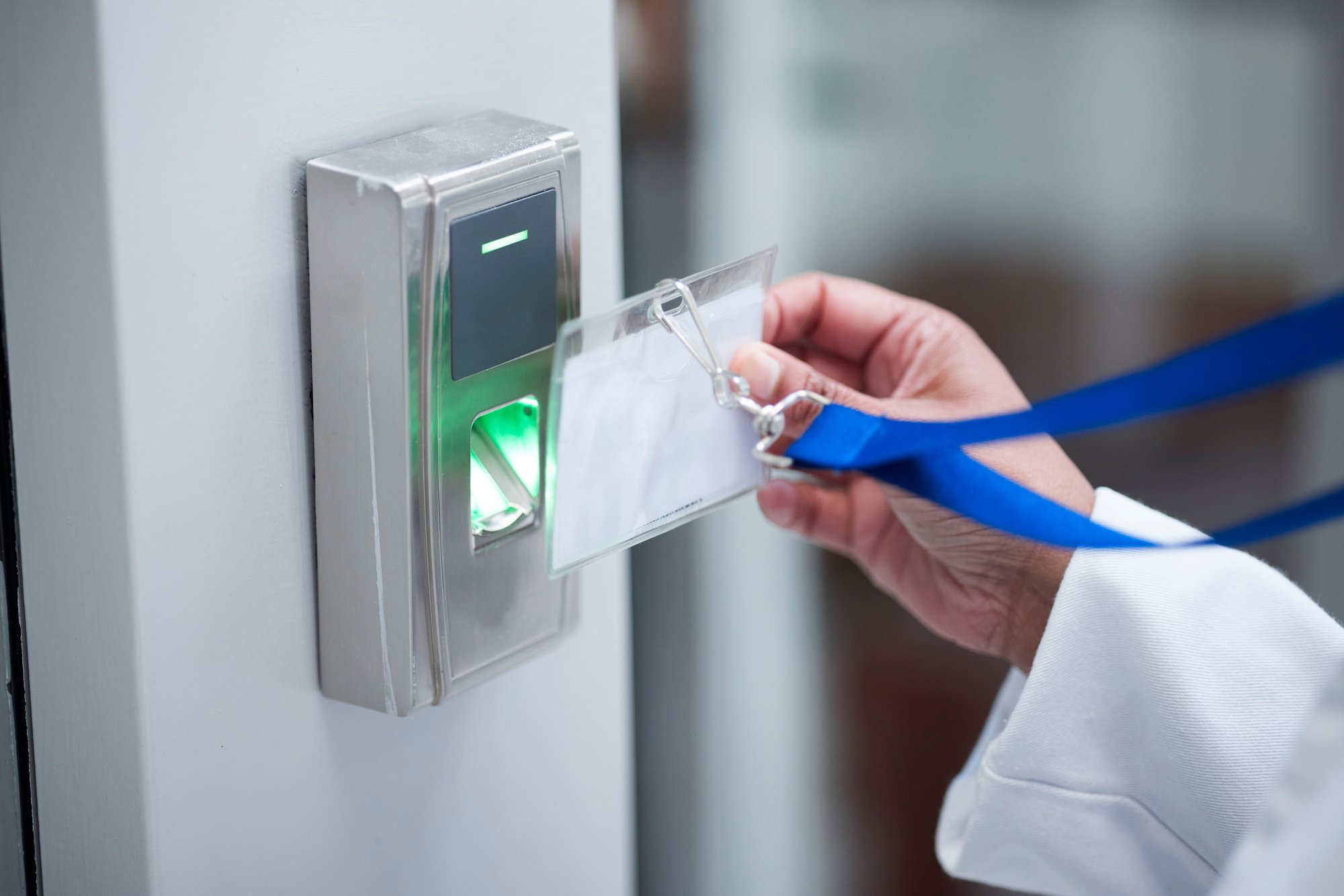 hand-key-card-and-fingerprint-for-security-door-automated controls