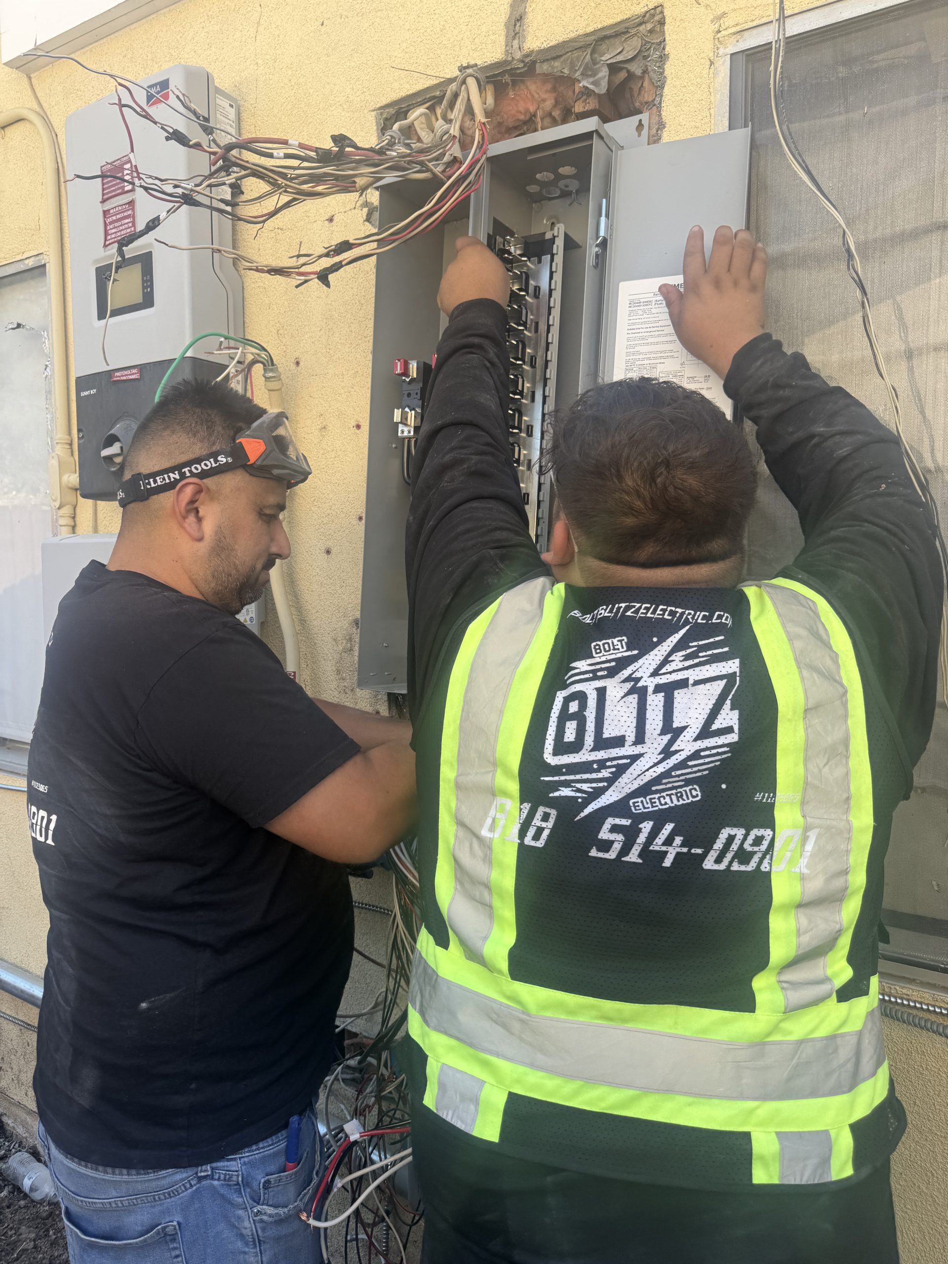 Electricians working